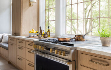 Kitchen area with window blinds.