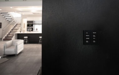 Discrete lighting control panels in a modern home.