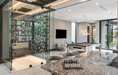 Luxury Boca Estate wine rack and games room.