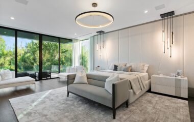 Luxury Boca Estate bedroom with panoramic window.