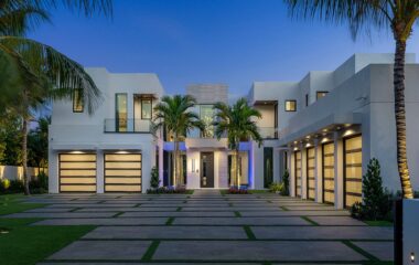 Luxury Boca Estate exterior view at dusk.