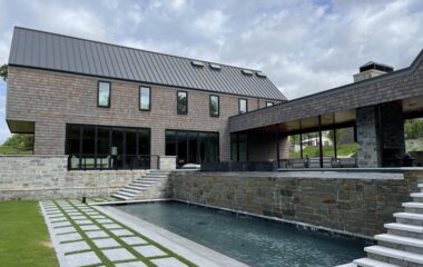 Exterior view of a luxury lakefront retreat.